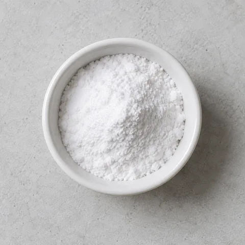 Baking soda in a small white ramekin.