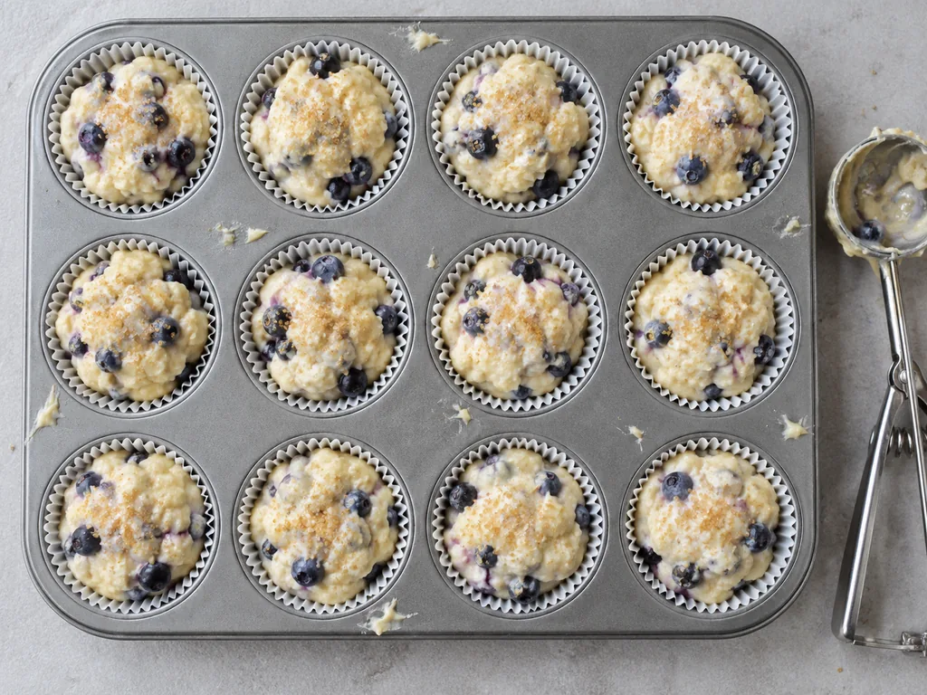 Fill the cups. Sprinkle the turbinado sugar evenly over the tops, using all of it if the berries tasted tart and a little less if they were sweet.